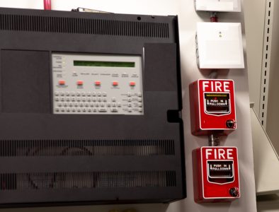 Security guards are learning how to use fire alarm panel