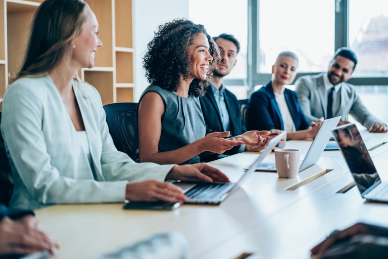 Employees at a meeting