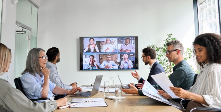 Diverse company employees having an online conference