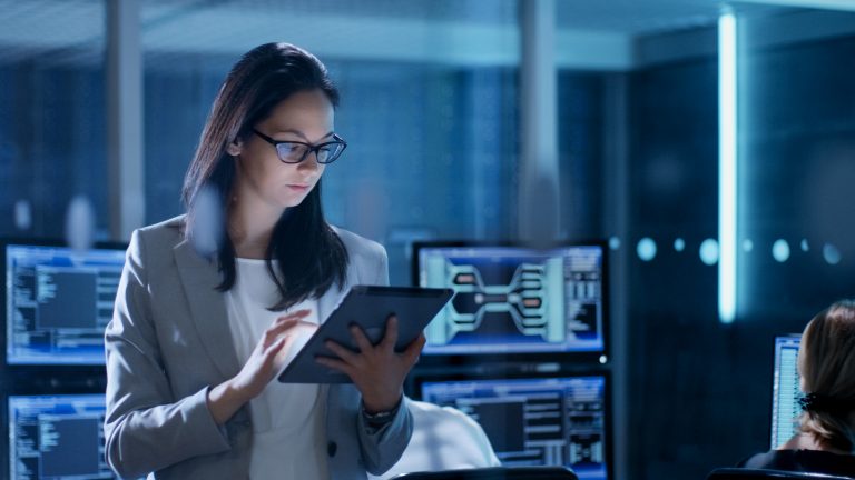 Young female government employee using a tablet