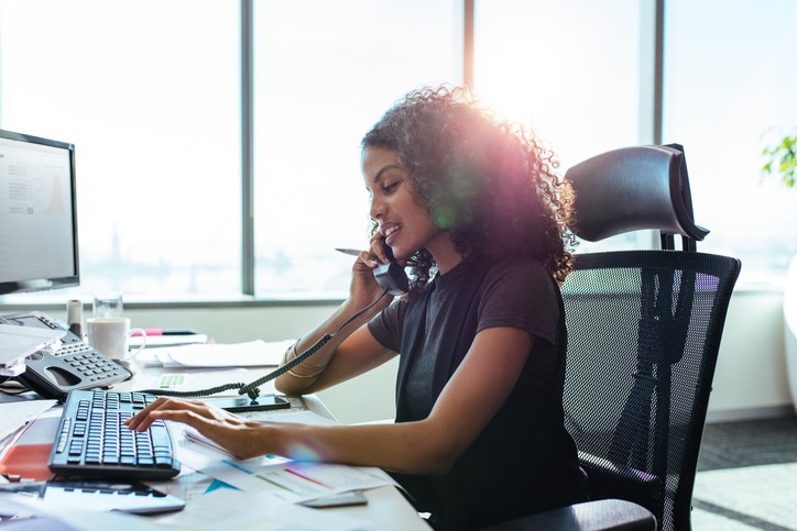 A female employee using the phone