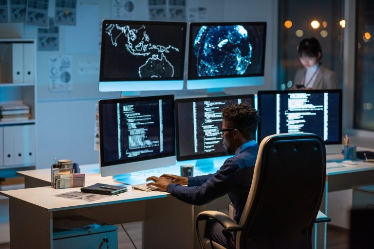 An employee in front of a computer